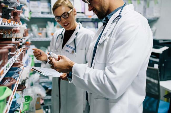 Pharmacist in white coats 