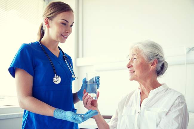 Nurse with Patient - TouchPoint Medical